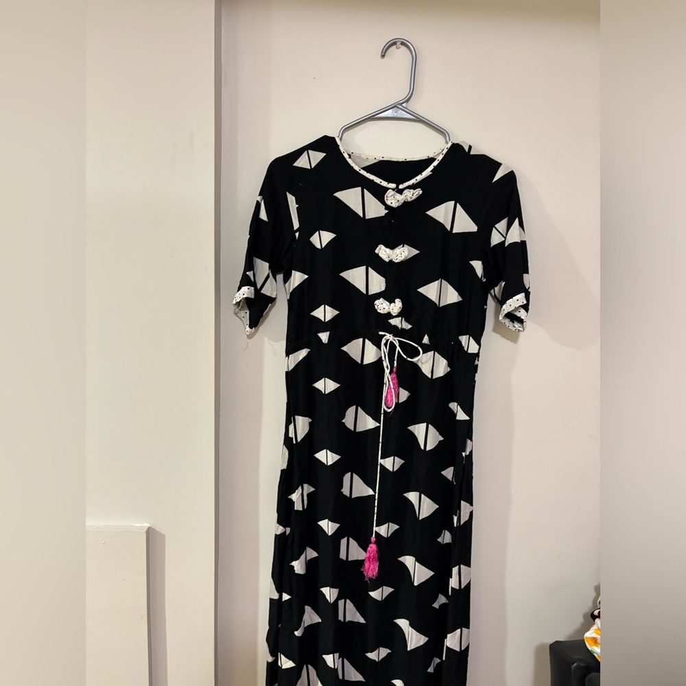 Black and White Geometric Dress with Pink Tassel